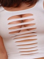 Krissy shows off her huge tits in a ripped top