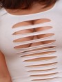 Krissy shows off her huge tits in a ripped top
