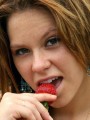 18 year old Kandie gets naked and enjoys some strawberrys in a park