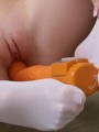 Red Headed teen slut fucks her tight pussy with a huge toy