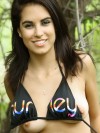 Teen strips out of her bikini in a public park