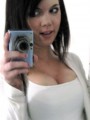 Super cute teen takes selfshot pictures of herself in the mirror