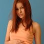 Free Porn Gallery Kori nipping in her peach top