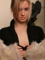Kristin gets outta her fur jacket...